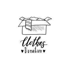 Hand drawn illustration with donation box and lettering text. Concept of clothes donate, charity, care concept. Doodle sketch style elements of clothes for logotype, banner, icon design. Vector