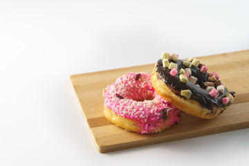 two doughnuts isolated on white background. copy space