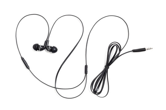 Earphones Headset On A White Background. Ear Plugs For Music Lovers In The Shape Of A Heart. Vacuum Wired Black Headphones For Listening Music And Sound On Portable Devices. In-ear Headphones.