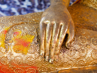Close up praying hands of Buddha. Praying hands golden of Buddha.