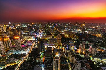 Bangkok city downtown and road traffic at sunset in Thailand