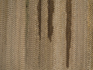 Evaporative cooling pad on background.air filter is a large brown.