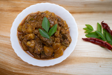 Beef curry, hot and spicy non vegetarian meat dish prepared using Indian spices in Kerala India.