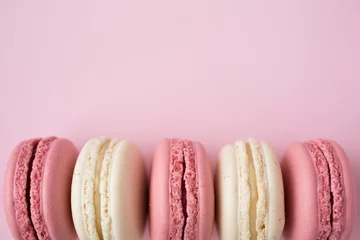 Peel and stick wall murals Macarons Row of white and pink macarons on pink