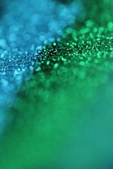 glitter background.blue and Green shiny gloss layout. Green and blue striped glitter with shining bokeh.. glitter brilliant mockup