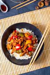 Hot roasted chicken with rice and vegetables