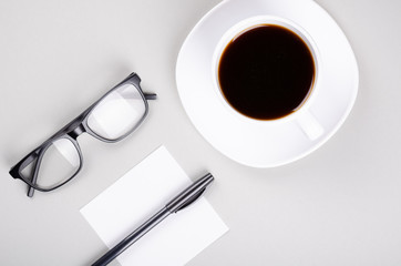 Coffee cup composition on gray background. Flat lay.