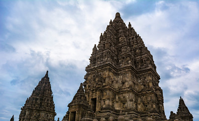 The temples in Prambanan Temple complex in the boundary between Klaten Regency and Yogyakarta Province in Java Island, Indonesia; taken at a cloudy afternoon.