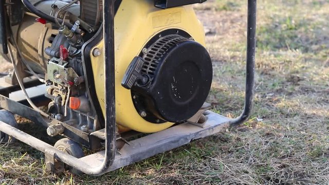 Close-up. The master starts the station through manual start to generate electricity.