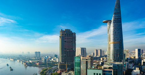 Ho Chi Minh (Saigon) City, Vietnam - CIRCA 2019: Saigon aerial cityscape, showing Saigon River on the left and Bitexco Financial Tower on the right.