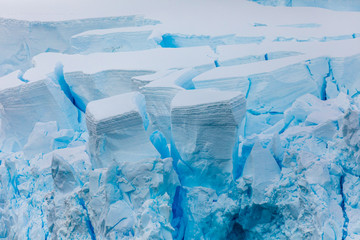 Glacial ice about to calve into icebergs on a mountain in Antarctica
