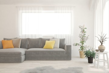 Stylish room in white color with sofa. Scandinavian interior design. 3D illustration