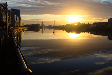 An amazing sunrise over the river Clyde in Glasgow, Scotland on a cold clear winter morning