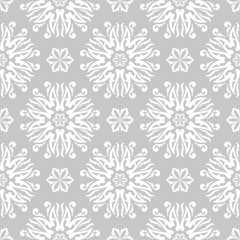 Floral seamless pattern. White design on gray background