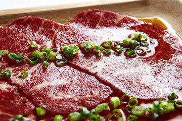 Yakiniku, thin sliced beef with scallion 