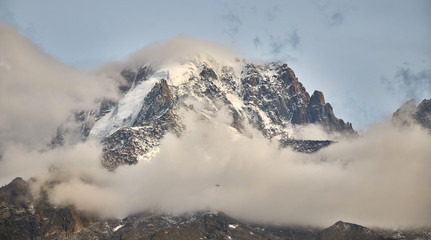 Fototapeta na wymiar Peak Mont Blanc cloudy from Chamonix