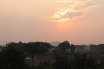 Panoramic view of mountains, autumn landscape with foggy hills at sunrise.