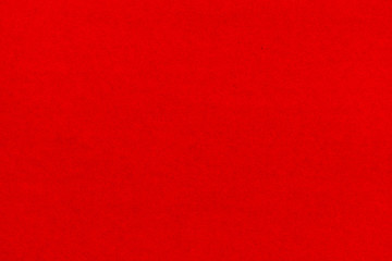 Red background. Velvet paper texture.