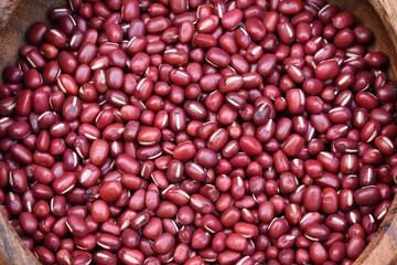 close up of red beans in wooden bowl