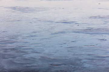 Ice on the lake in the morning as a background