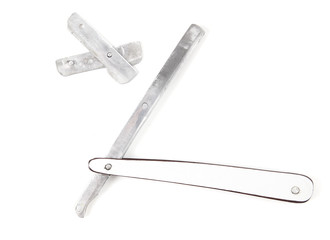 Dangerous razor for cutting hair isolated on a white background