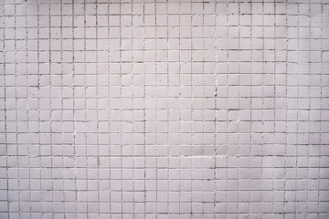 background of dark white brick laid horizontally