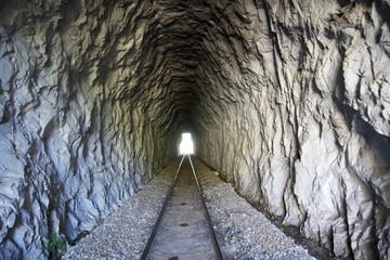 Railway road and tunnel in the mountain