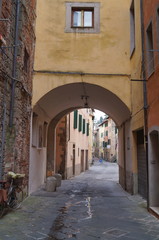 Fototapeta na wymiar Typical alley in Pescia, Tuscany, Italy