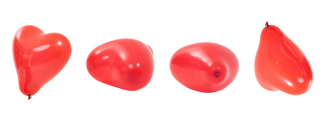 Czerwone balony w kształcie serca na białym tle © piotrszczepanek