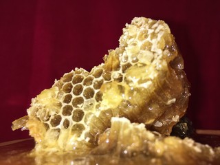 abstract hexagonal background natural fresh golden liquid honey honeycombs