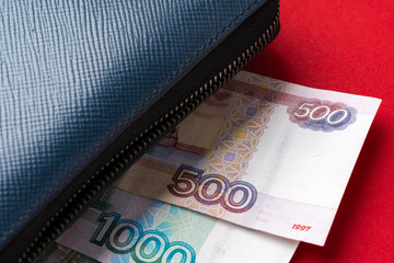Blue wallet full of money Russian Ruble