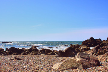 Waves breaking on rocks