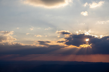 Sunlight penetrating through the clouds