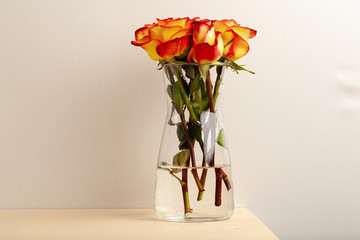 Fresh cut red and yellow roses bunch