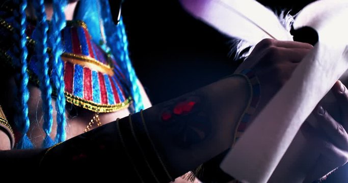 Close up of an ancient deity with a feather, writing a scroll, Thoth, 4k