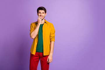 Omg what do. Frightened upset guy made terrible mistake feel fear bite nails wear modern youth outfit isolated over vibrant color background
