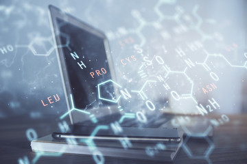 Desktop computer background and formula hologram writing. Double exposure. Education concept.