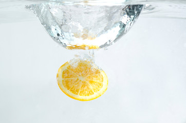 Lemon in the Water on White Background.
