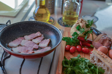 meat and vegetables in a pan