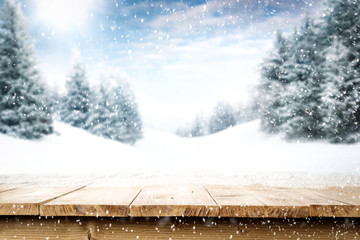 Desk of free space and winter background 