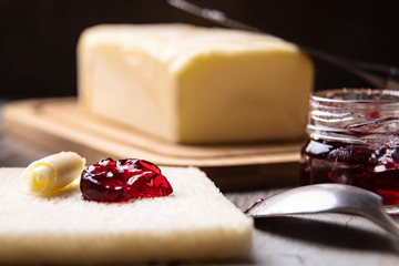 Toast with butter and red fruit jam