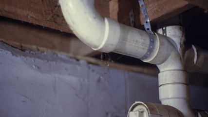 plumbing pipes under floor