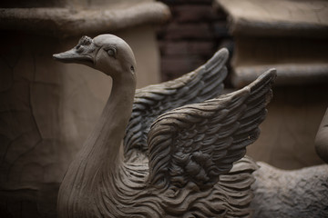 Clay idols of swan/duck being made for the Indian Bengali festival in winter in Bengal. Indian culture and religion.