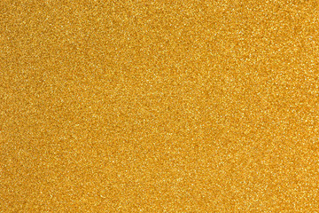 Fototapeta premium Gold background light. Golden glitter texture.