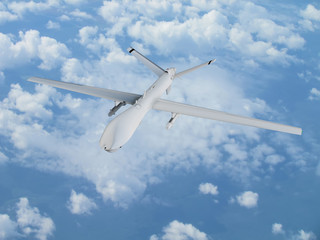 military RC military drone flies flies against backdrop of beautiful clouds on blue sky background