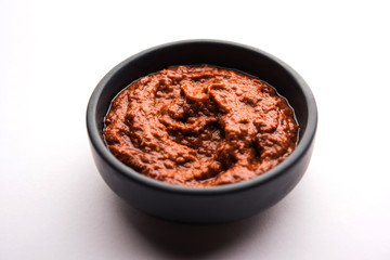 Homemade Tandoori Paste or Marinade mixture, in a bowl. used for grilled chicken or Paneer or vegetable. selective focus