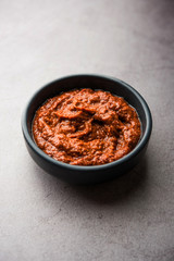 Homemade Tandoori Paste or Marinade mixture, in a bowl. used for grilled chicken or Paneer or vegetable. selective focus