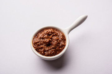 Homemade Tandoori Paste or Marinade mixture, in a bowl. used for grilled chicken or Paneer or vegetable. selective focus
