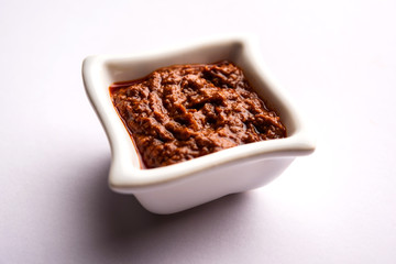 Homemade Tandoori Paste or Marinade mixture, in a bowl. used for grilled chicken or Paneer or vegetable. selective focus