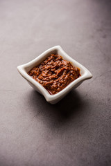 Homemade Tandoori Paste or Marinade mixture, in a bowl. used for grilled chicken or Paneer or vegetable. selective focus